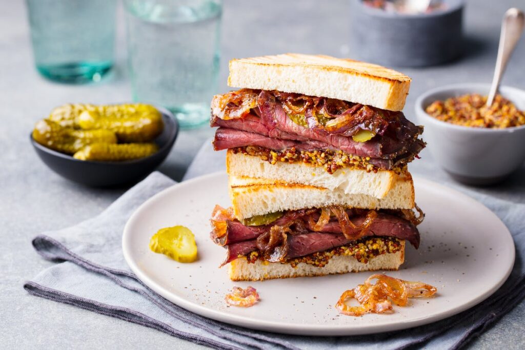 MINI ROAST BEEF SANDWICHES WITH CARAMELIZED ONIONS Image